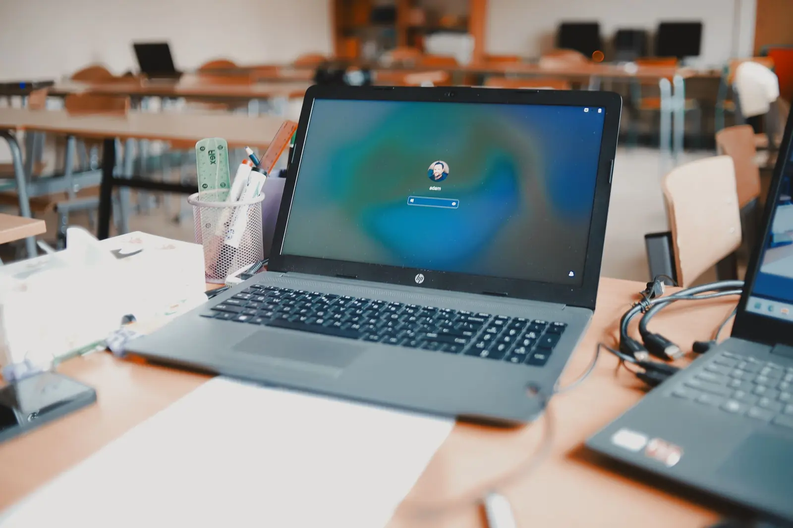 Students using Chromebooks in a modern classroom